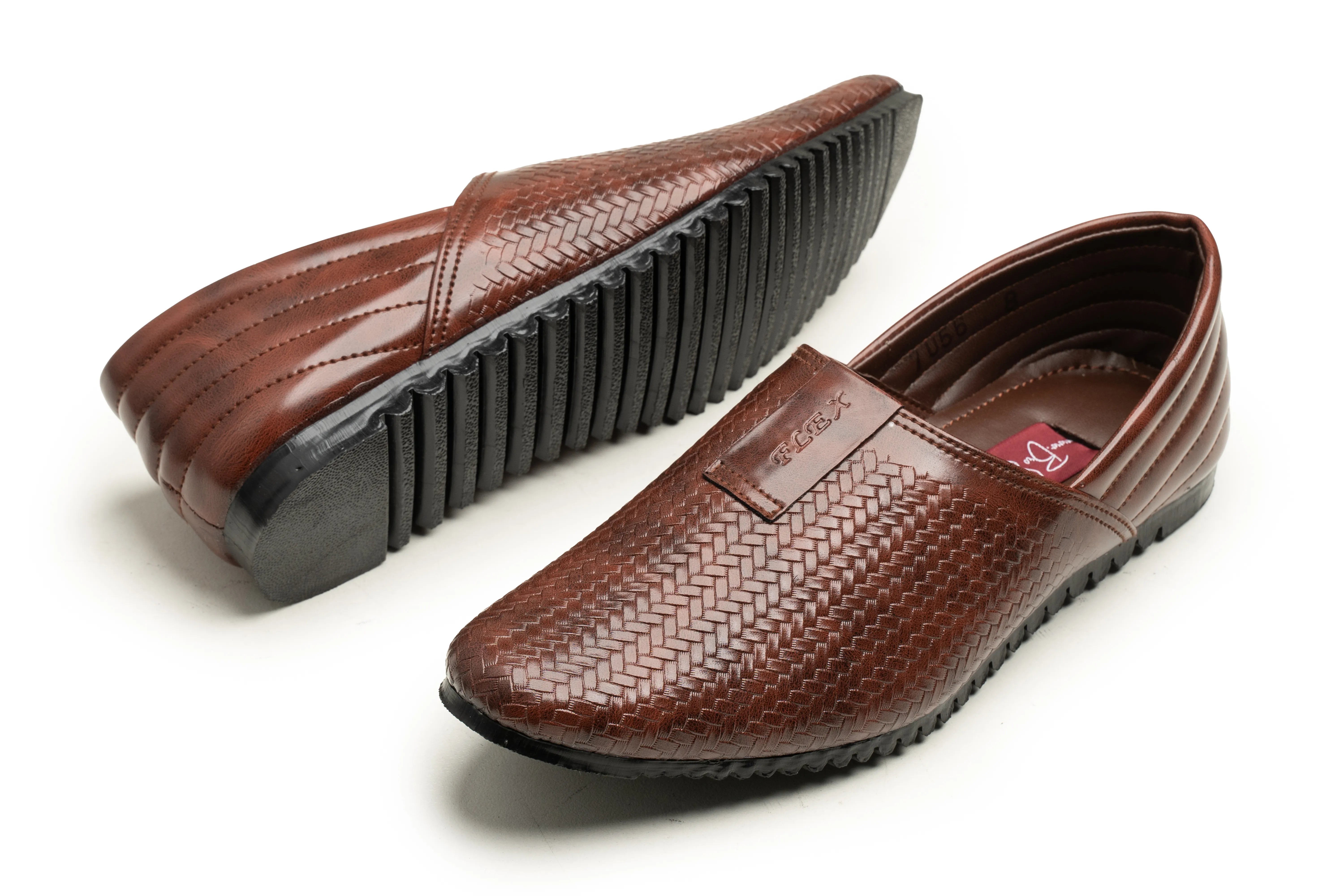A pair of brown slip-on loafers with a textured woven upper and black ribbed soles, shown on a clean white background.