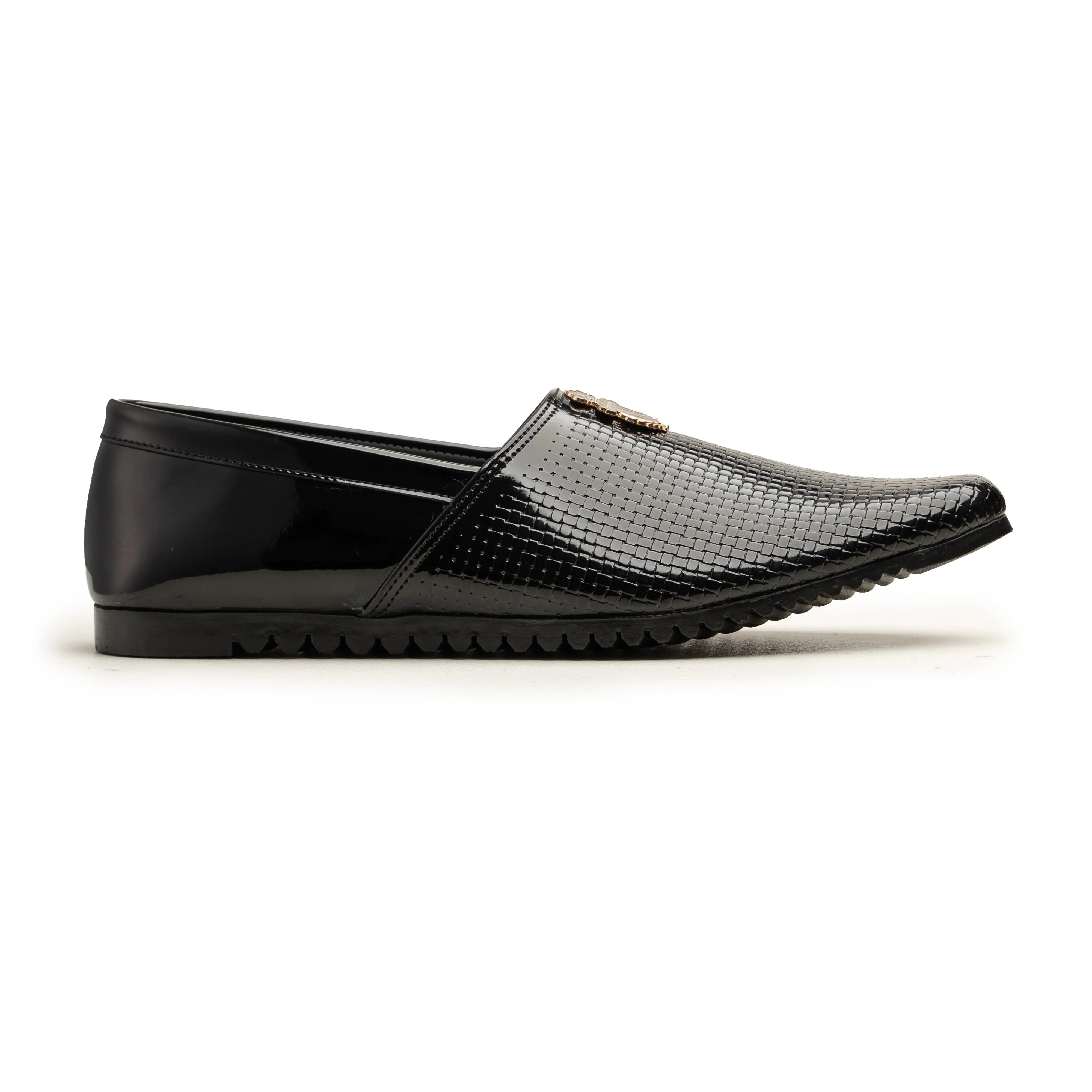 A single black slip-on loafer shoe with a glossy patent leather side and a textured perforated upper, featuring a small gold-tone metal accent on the toe, shown against a plain white background.